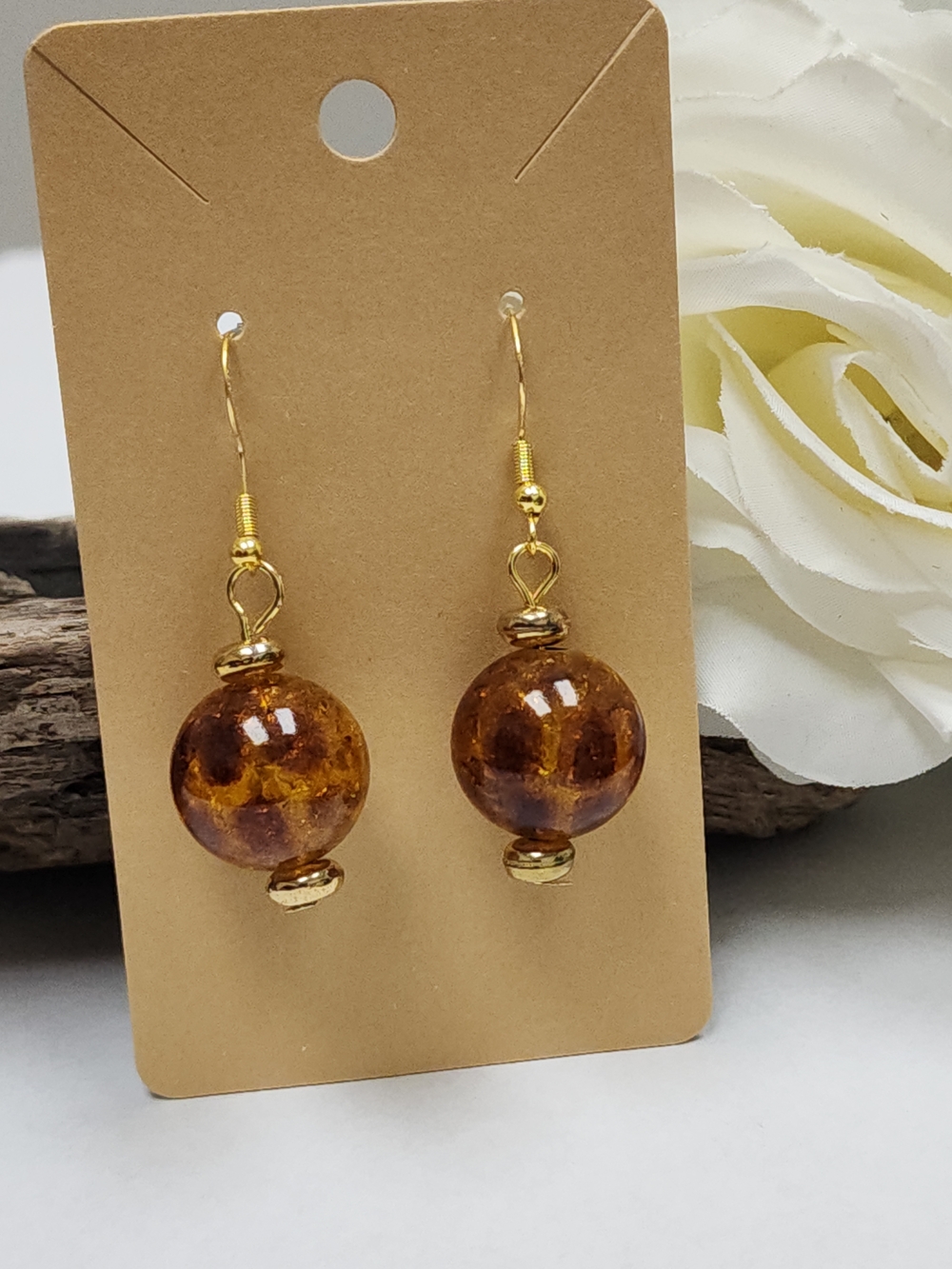 Gold-Tone Dangle Earrinfs With Brown And Amber Colored Animal Print Beads
